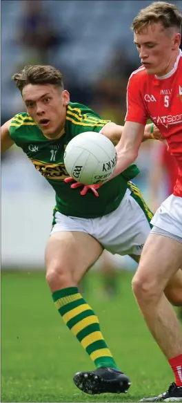  ??  ?? Louth’s Leonard Grey breaks away from Kerry star man David Clifford during