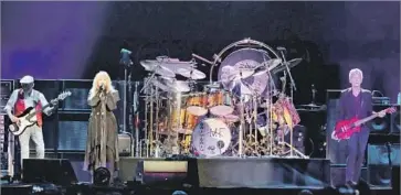  ?? Francine Orr Los Angeles Times ?? FLEETWOOD MAC’S John McVie, left, Stevie Nicks, Mick Fleetwood and Lindsey Buckingham perform.