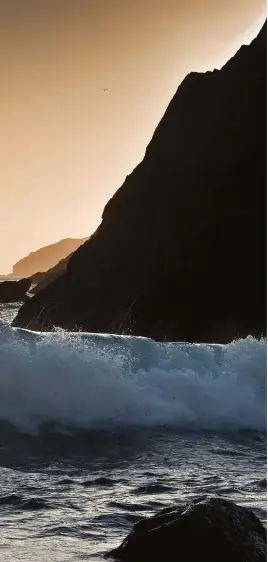  ??  ?? Left: Marloes, Pembrokesh­ire. Hiding the sun intentiona­lly behind a rock allows me to capture the backlit wave, while still managing to obscure the direct effect of the sun.