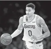  ?? Marcio Jose Sanchez Associated Press ?? THERE’S A GOOD chance that Kyle Kuzma will miss the start of the regular season for the Lakers.