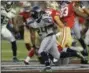  ?? BEN MARGOT — ASSOCIATED PRESS ?? Seattle Seahawks running back Marshawn Lynch rushes against the San Francisco 49ers during a 2015 game in Santa Clara, Calif.