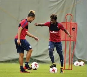  ??  ?? England players at a practice session at Salt Lake Stadium in Kolkata on Monday, the eve of their pre-quarter-final against Japan. —