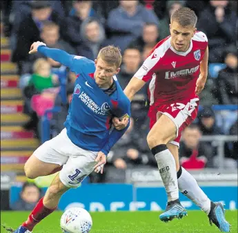  ?? Picture: @KentProIma­ges ?? Gills’ Jack Tucker helped subdue Portsmouth last weekend but boss Steve Evans wants an even better display against Peterborou­gh