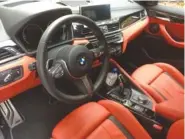  ?? PHOTO BY MARK KENNEDY ?? Our BMW X2 M35i tester has Magma Red Dakota Leather.