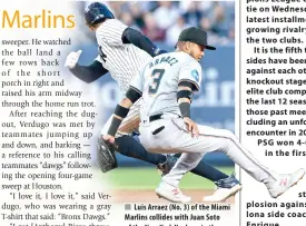  ?? AFP PHOTO ?? Luis Arraez (No. 3) of the Miami Marlins collides with Juan Soto of the New York Yankees in the bottom of the first inning at Yankee Stadium on Tuesday, April 9, 2024, in New York City.