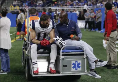  ?? DUANE BURLESON — AP PHOTO ?? New England Patriots wide receiver Julian Edelman (11) is taken off the field on a cart during the first half of an NFL preseason football game against the Detroit Lions, Friday, in Detroit.