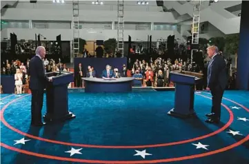  ?? OLIVIER DOULIERY/POOL PHOTO ?? Then-President Donald Trump, right, and Democratic challenger Joe Biden debate on Sept. 29, 2020, in Cleveland. Trump has said he is running for president in 2024, while Biden has yet to announce his plans.