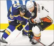  ?? Bill Boyce Associated Press ?? THE DUCKS’ Andrew Cogliano, right, scored his first man-advantage goal since 2011 on Sunday.