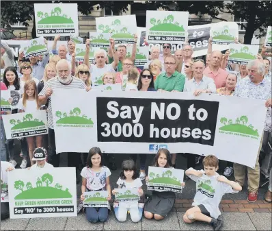  ?? PICTURE: TONY JOHNSON. ?? PLANNING ANGER: Protesters gather outside Harrogate Council offices to object against plans for 3,000 new homes.