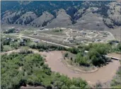  ?? ?? The Canadian Press
The swollen Bonaparte River runs through the Bonaparte First Nation north of Cache Creek, B.C.