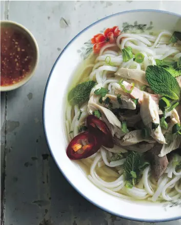  ?? JOHN LEE ?? “Great for pho beginners, this recipe is also terrific for cooks in a hurry. It involves less than 45 minutes, during which you’ll doctor up store-bought broth,” Andrea Nguyen writes of her quick chicken pho recipe.