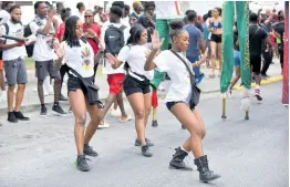  ?? LODGE PHOTOS BY ANTOINE ?? The GenXS dance team brings the vibes for attendees of the UWI carnival who had no choice, but to match their high energy.