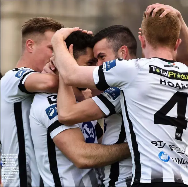  ?? Photo: Sam Barnes/Sportsfile ?? Patrick Hoban celebrates with teammates after scoring his side’s first goal during the Premier Division match against Bohemians at Dalymount Park. x