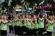  ?? GARY CORONADO / THE PALM BEACH POST ?? Team Wellington marches down Lake Avenue at the St. Patrick’s Day Parade in Lake Worth. Catch the annual parade at 6:30 tonight.