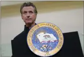  ?? JEFF CHIU — THE ASSOCIATED PRESS FILE ?? Gov. Gavin Newsom speaks at Asian Health Services in Oakland.