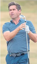  ?? Picture: PA. ?? Robert Rock keeps an eye on his shot on the 16th hole.