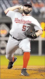  ?? AP/MATT SLOCUM ?? After Game 4 of the National League division series between the Washington Nationals and Chicago Cubs was postponed to today because of rain, Tanner Roark is expected to get the start instead of Stephen Strasburg.