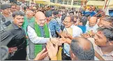  ?? PTI ?? ▪ BJP chief Amit Shah interacts with representa­tives of Handloom &amp; Powerloom Associatio­ns in Tamil Nadu’s Erode on Thursday.