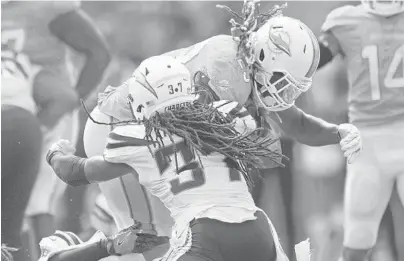  ?? JIM RASSOL/STAFF PHOTOGRAPH­ER ?? Jay Ajayi ran for 122 tough yards against the Los Angeles defense. A great start to his 2017 season.