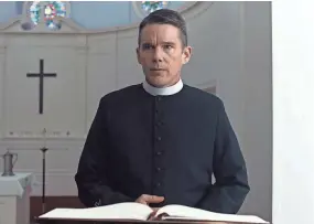  ?? A24 ?? Ethan Hawke plays a troubled pastor with troubled parishione­rs in "First Reformed."