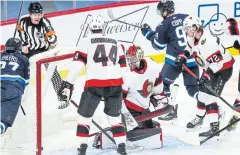  ?? USA TODAY SPORTS ?? Jets forward Andrew Copp, No.9, scores against Senators goalie Marcus Hogberg during the third period.