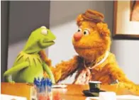  ??  ?? “The Muppets,” featuring Kermit and Fozzie Bear, returns to primetime with a contempora­ry, documentar­y-style show on ABC. For the first time, the series will explore the Muppets’ personal lives and relationsh­ips, both at home and at work. Provided by ABC