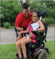  ?? MEDIANEWS GROUP FILE PHOTO ?? Lamoni Green with her proud mom, Tanya Green. Lamoni in her Pennsylvan­ia’s “Junior Miss Amazing” tiara in 2021.