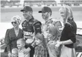  ?? PATRICK BREEN/THE REPUBLIC ?? Clint Bowyer and his family take a picture with Jimmie Johnson, center, and his family on Sunday.