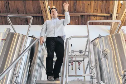  ?? COLIN MACLEAN/JOURNAL PIONEER ?? Alex Clark showing off some of the new equipment his fledging brewing company recently installed in its location inside the former Summerside Rotary Library.