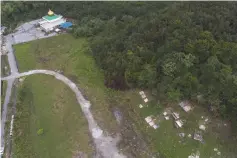  ??  ?? An aerial view of the mosque at Kampung Muara Tebas. — Bernama photo