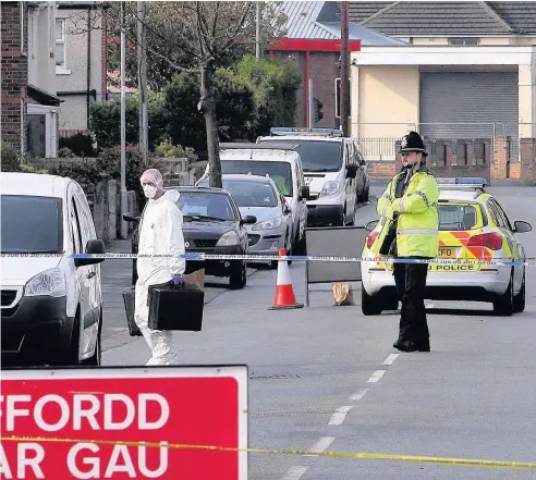  ?? Hadyn Iball ?? > Police continued their investigat­ions at Prince Edward Avenue in Rhyl yesterday after a man died of stab wounds on Sunday