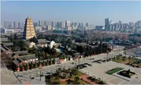  ?? Photograph: Xinhua/REX/Shuttersto­ck ?? An aerial view of the deserted city of Xi'an, in northwest China's Shaanxi Province, which has been under a strict coronaviru­s lockdown.