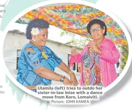  ?? Picture: JOHN KAMEA ?? Ulamila (left) tries to outdo her sister-in-law Inise with a dance move from Koro, Lomaiviti.