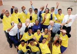  ?? PICTURE: DAVID RITCHIE/AFRICAN NEWS AGENCY (ANA) ?? EXCITED: Masiphumul­ele High School pupils with principal Nelson Mafrika, David Bellairs, Jason Stone and Ken Sturgeon of the Cape Town Cycle Tour, Collen Nkune and Min-Kyn Kim of the World Mission Society Church of God and water station manager...