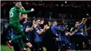  ??  ?? Atalanta celebrate their big 4-1 over Valencia, but the game has since been described as a 'biological bomb'