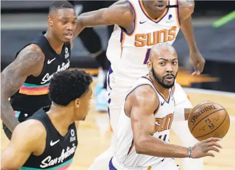  ?? AP ?? Former Sun Jevon Carter (r.) is one of three Nets who could be odd man out as team tries to get down to 15 players.