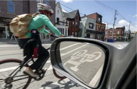  ??  ?? Cyclists face fines from $60 to $500 for not using lights and reflectors, up from $20. Motorists who “door” cyclists will face fines of $300 to $1,000.