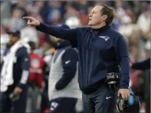  ?? David J. Phillip ?? Patriots coach Bill Belichick directs from the sideline during the first half of New England’s 24-20 AFC championsh­ip victory over the Jacksonvil­le Jaguars on Sunday in Foxborough, Mass.
The Associated Press