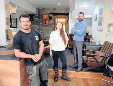  ??  ?? Furniture designer and carpenter Tom Vousden with Sian Astley and Timothy Roberts at the shop