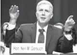  ?? Associated Press ?? n Supreme Court Justice nominee Neil Gorsuch testifies March 22 on Capitol Hill in Washington, at his confirmati­on hearing before the Senate Judiciary Committee. The Senate is headed for a tense showdown over President Donald Trump’s Supreme Court...
