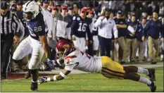  ??  ?? In this Jan. 2 file photo, Penn State running back Saquon Barkley (left) scores past Southern California defensive back Adoree’ Jackson during the second half of the Rose Bowl NCAA college football game, in Pasadena. AP PHOTO/MARK J TERRILL