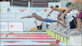  ?? HT PHOTO ?? Anand Anilkumar takes off after Srihari Nataraj finished his 100m in the 4x100m freestyle relay.