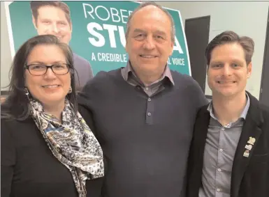  ?? JAMES MILLER/Okanagan Weekend ?? Green Party leader Andrew Weaver, centre, chats with 2017 Penticton candidate Connie Sahlmark and Robert Stupka, who is running in Kelowna West in the upcoming byelection.