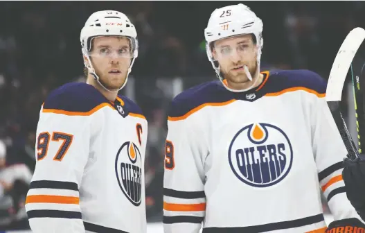  ?? BRUCE BENNETT/GETTY IMAGES ?? Connor Mcdavid and Leon Draisaitl willed their Oilers to a 4-3 overtime win over the Washington Capitals on Thursday, and are in the Top 5 in NHL scoring.