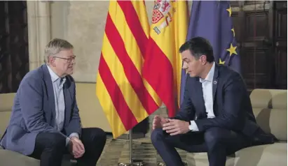  ?? Photo: GVA ?? Flags for all tastes - a backdrop for Ximo Puig and Pedro Sánchez