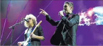  ?? Chase Stevens ?? Las Vegas Review-journal @csstevensp­hoto Brandon Flowers, right, and Dave Keuning of The Killers perform April 6, 2016, during the grand opening of T-mobile Arena in Las Vegas. They will play again Dec. 11 at the Palms.