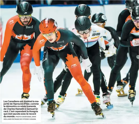  ?? PHOTO COURTOISIE, DAVE HOLLAND PATINAGE DE VITESSE CANADA ?? Les Canadiens ont dominé la majorité de l’épreuve d’hier, comme le démontre ce relais transmis de Charles Hamelin à Samuel Girard. C’est cependant la Hongrie qui s’est sauvée avec le record du monde.