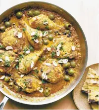  ?? DAVID MALOSH/THE NEWYORKTIM­ES ?? James Beard’s Farmer’s Chicken. Beard said he adapted this recipe for chicken with olives from Spanish immigrants who worked on ranches in California. See the recipe on pg. 3.
