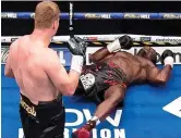  ??  ?? Howitzer: Povetkin’s brutal uppercut sent Whyte tumbling in the fifth round