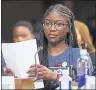  ??  ?? Aalayah Eastmond, a student at Marjory Stoneman Douglas High School, looks up after speaking Friday.